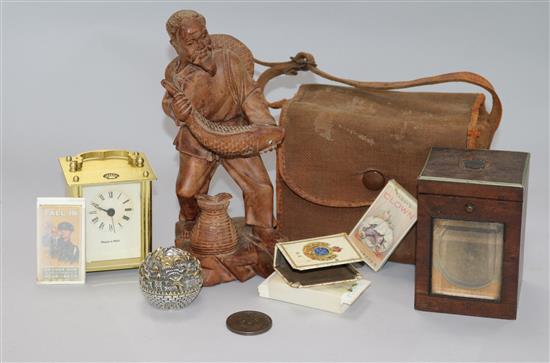 A travelling watch case, a miniature timepiece and sundries